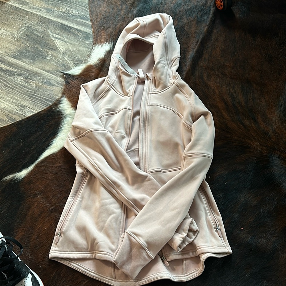 Light pink Lulu jacket! 
Super cute, just too tight
